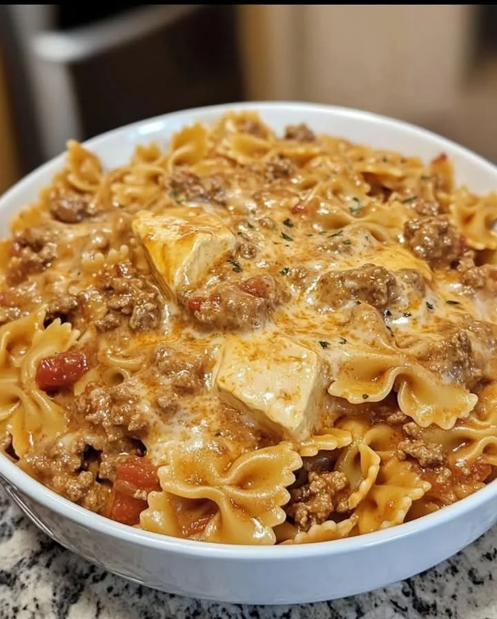 Creamy Velveeta beef bowtie pasta dish served in a bowl