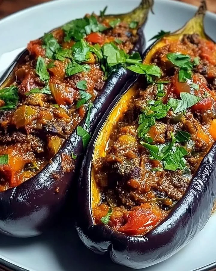 Delicious Karniyarik dish featuring stuffed eggplants with beef and spices.