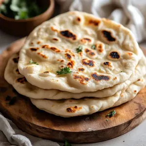 Quick and easy sourdough naan bread fresh out of the skillet
