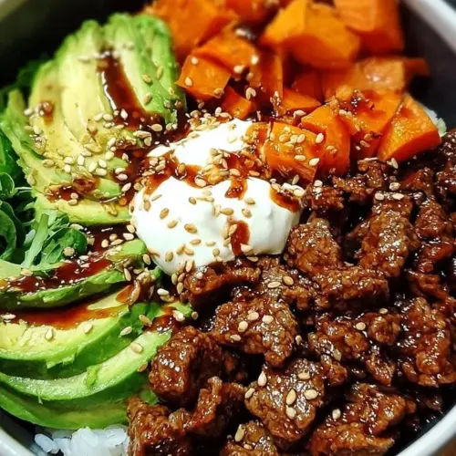 Sweet and Spicy Hot Honey Beef Power Bowl with colorful vegetables
